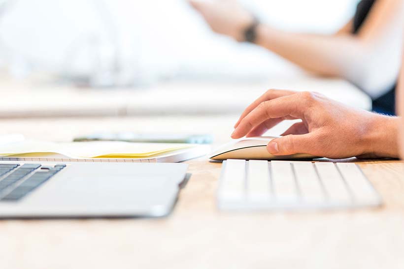 Man with mouse keyboard and computer