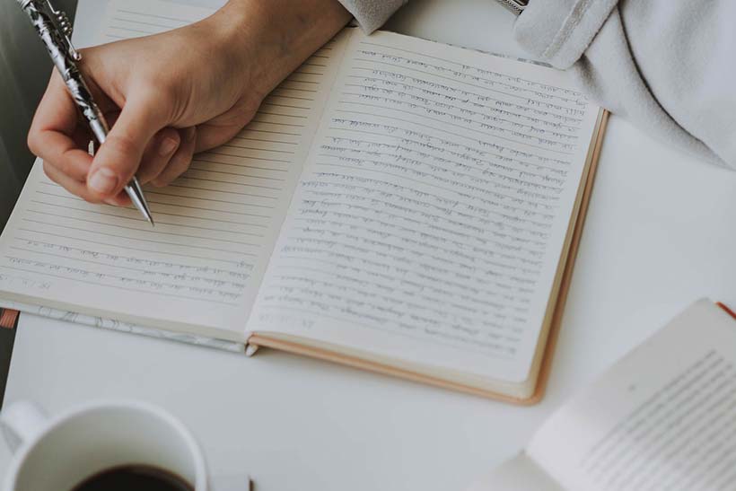 Woman with notebook